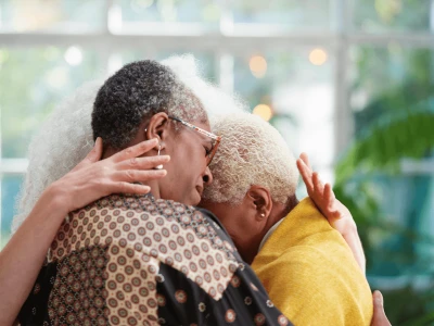 Women embracing
